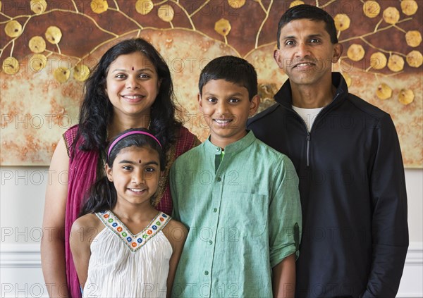 Close up of Indian family smiling