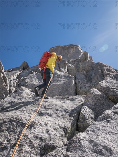 Caucasian climber on mountainside