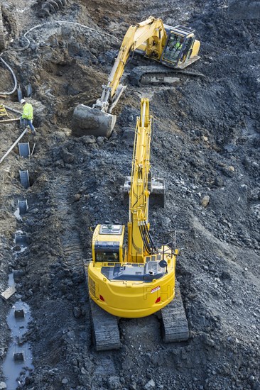 Diggers at construction site