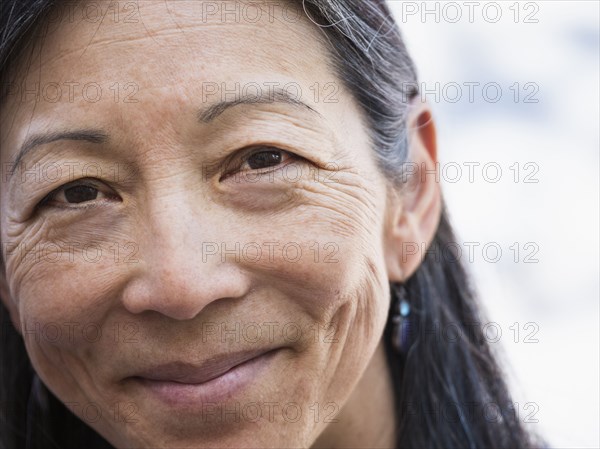 Close up of face of smiling Japanese woman