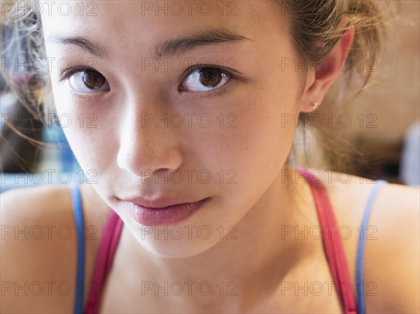 Close up of face of Mixed Race girl