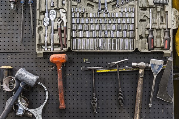 Tools hanging on pegboard