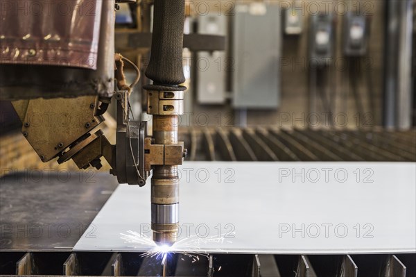 Sparking cutting tool in metal fabrication factory