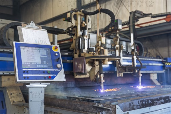 Control panel and machinery fabricating metal in factory