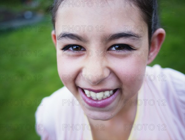 Close up of mixed race girl laughing