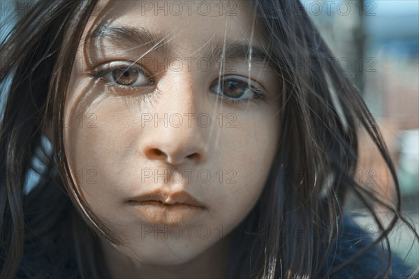 Close up of face of mixed race girl