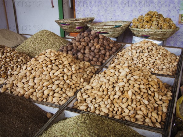 Bins of nuts and grains for sale in market