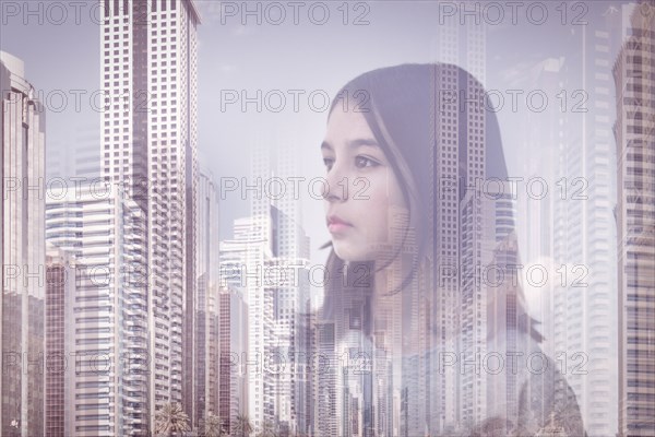 Double exposure of mixed race girl over Palmerston North cityscape