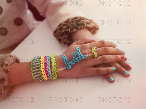 Mixed race girl wearing handmade jewelry