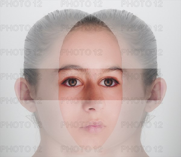 Double exposure of face of mixed race girl