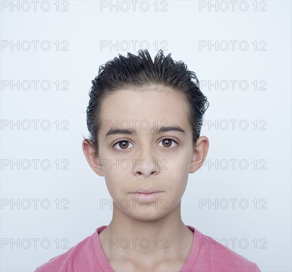 Close up of serious mixed race boy