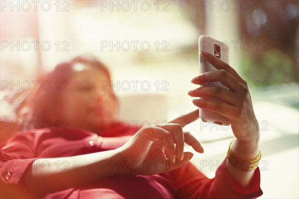 Indian woman using cell phone