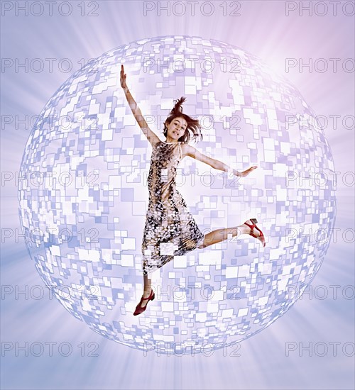 Mixed Race girl floating in hovering pixel sphere