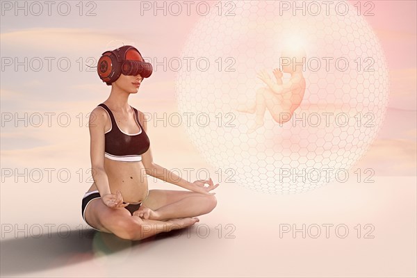 Expectant mother wearing virtual reality goggles meditating about baby