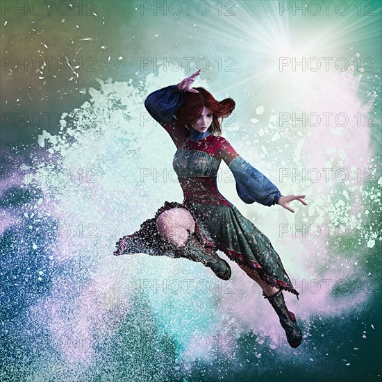 Powder splashing on woman in mid-air wearing dress