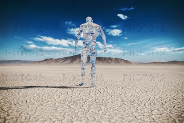 Transparent man walking in desert