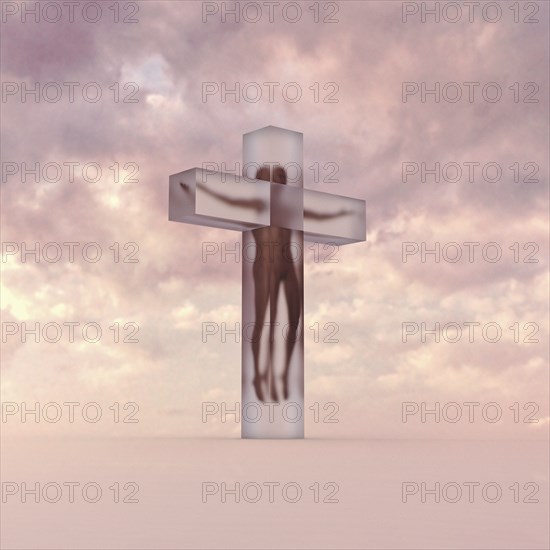 Person in suspended animation inside crucifix