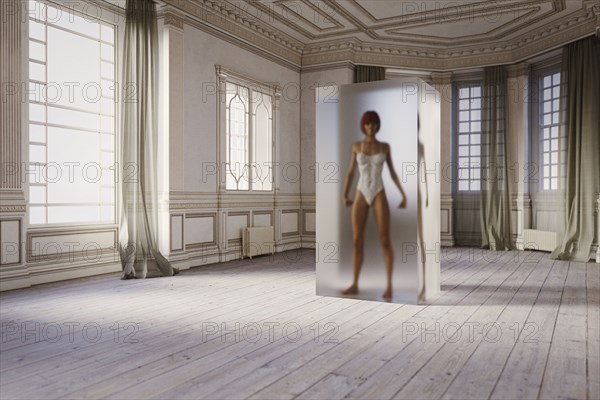 Woman in suspended animation inside room