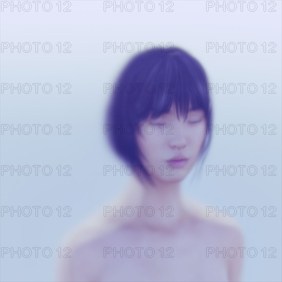 Portrait of defocused woman