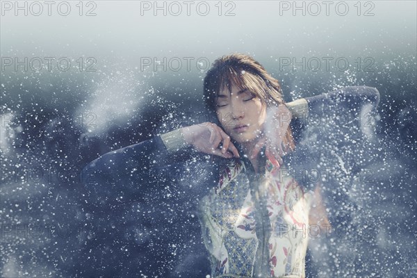 Droplets splashing near woman