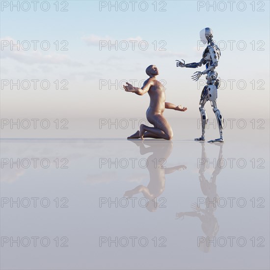 Man kneeling near robot