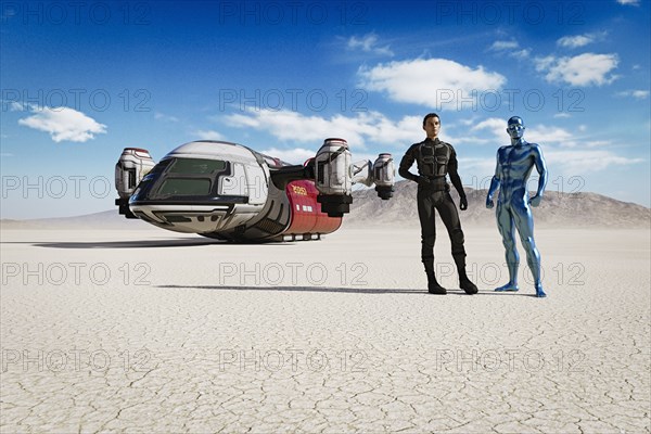 Man and robot in desert with futuristic vehicle