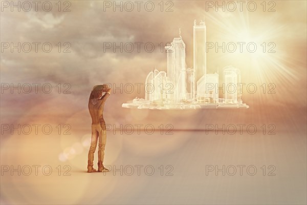 Man looking at distant floating futuristic glass city