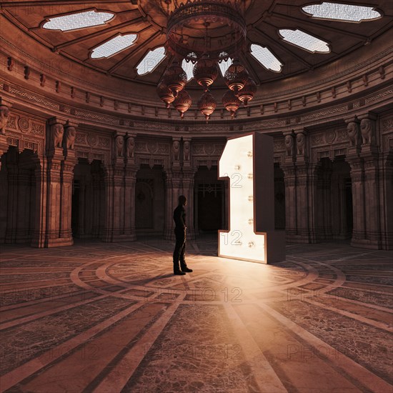 Man admiring illuminated number 1 in ornate atrium