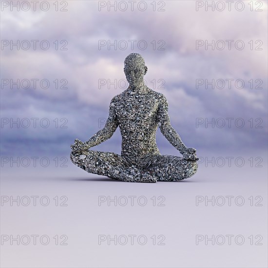 Stone man meditating under clouds