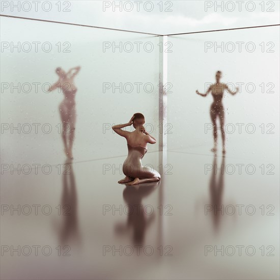 Women separated by glass walls