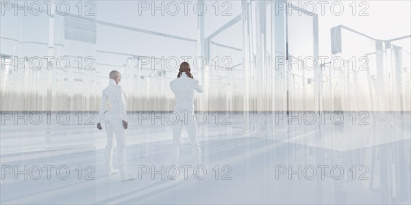 People standing near glass maze