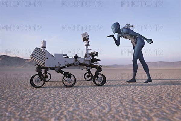 Futuristic woman blowing a kiss to robot in desert