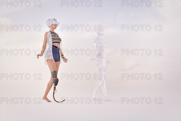 Woman with artificial leg wearing virtual reality goggles