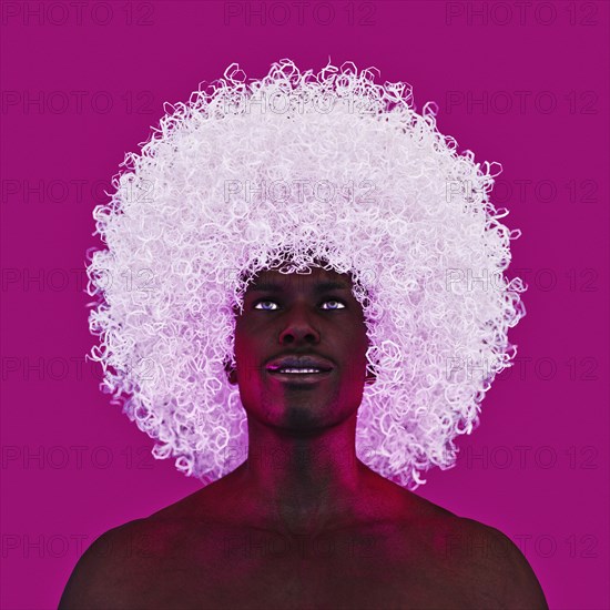 Man with large white afro