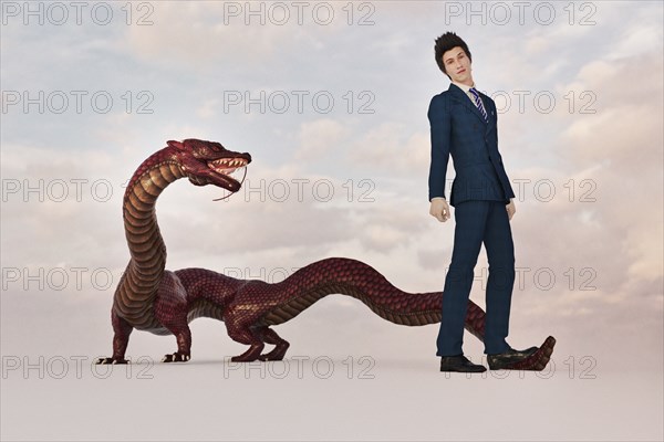 Businessman standing on tail of dragon