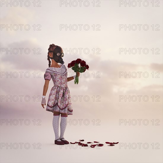 Girl wearing gas mask holding flowers