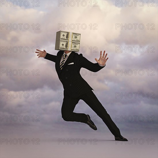 Businessman with head of money