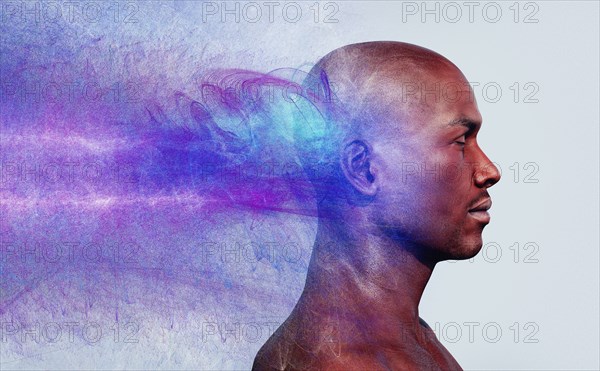 Energy flowing behind head of man