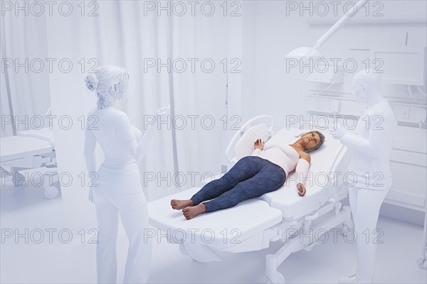 Woman laying on gurney in white hospital