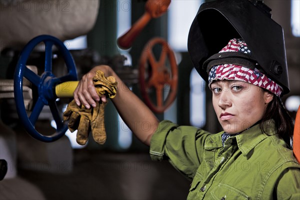 Serious Hispanic welder