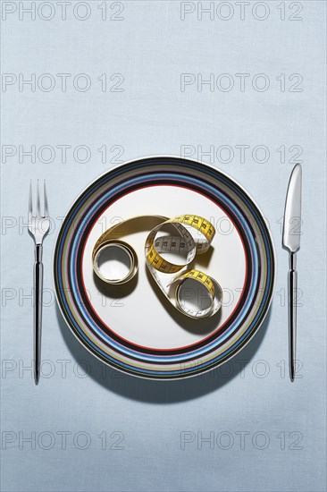 Tape measure on plate