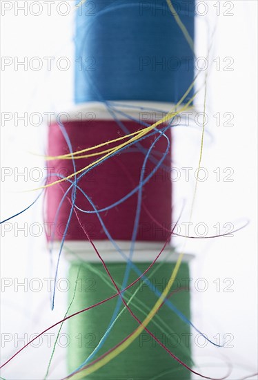 Stacks of spools of multicolor thread