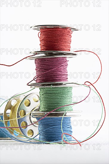 Stacks of spools of multicolor thread