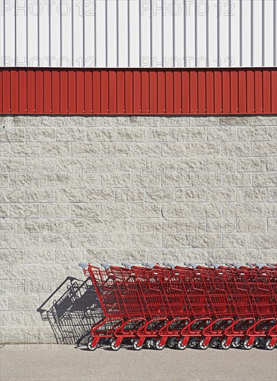 Shopping carts stacked together outside store