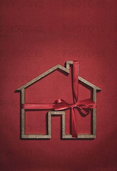 House shape wrapped in ribbon