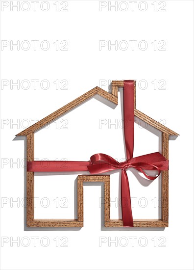 House shape wrapped in ribbon