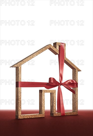 House shape wrapped in ribbon