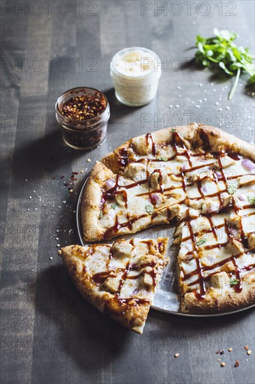 Close up of pizza slice on platter