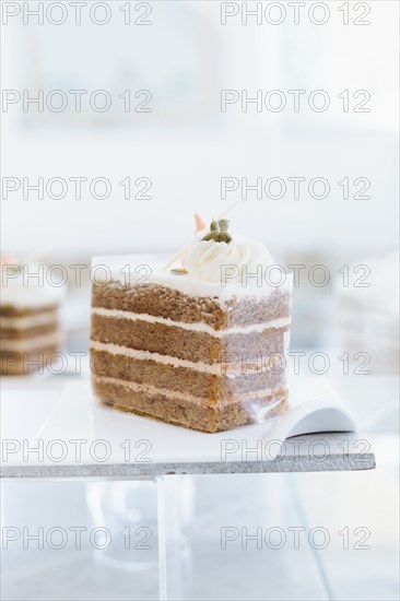Close up of platter of cake on cafe counter