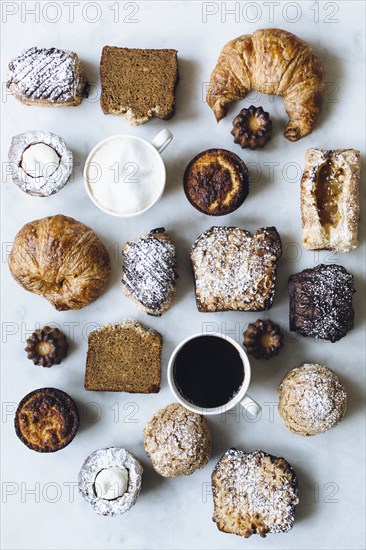 High angle view of variety of pastries and coffee